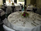 White Chair Covers and Chocolate Taffeta Sash